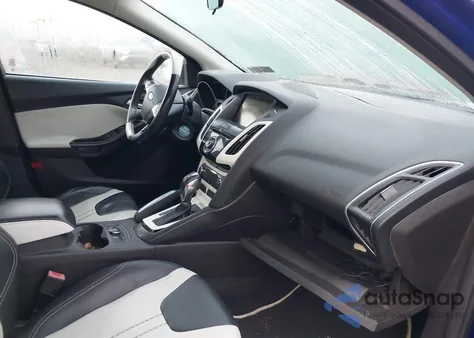 2013 Ford Focus Titanium z USA, uszkodzony, nr VIN 1FADP3N27DL156023